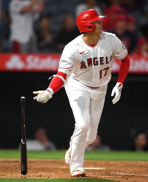 Shohei Ohtani of the Los Angeles Angels drops his bat after hitting a home run in the eighth against the Detroit Tigers at Angel Stadium of Anaheim...