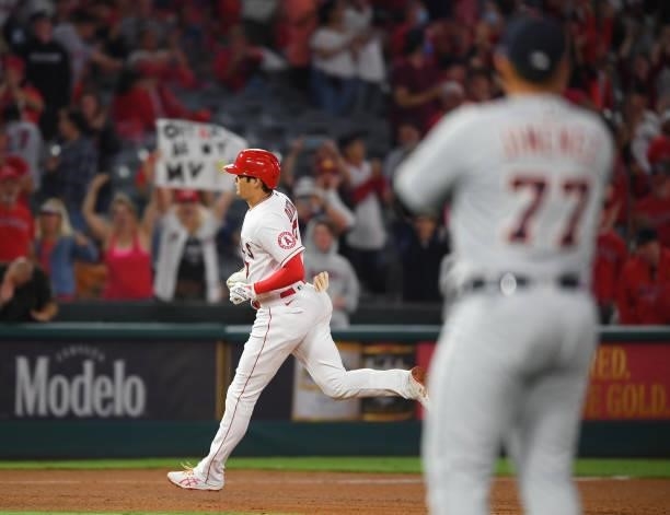 Shohei Ohtani of the Los Angeles Angels rounds the bases after hitting a home run in the eighth against the Detroit Tigers at Angel Stadium of...