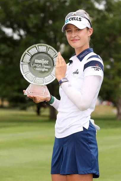 Nelly Korda poses with the trophy after winning the Meijer LPGA Classic for Simply Give at Blythefield Country Club on June 20, 2021 in Grand Rapids,...