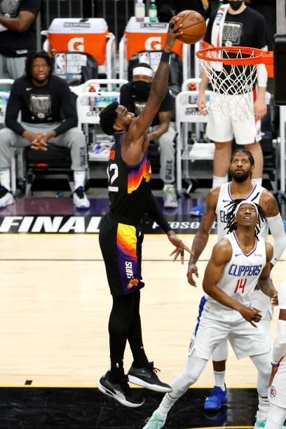 Deandre Ayton of the Phoenix Suns goes up for a dunk in the second quarter against Terance Mann of the Los Angeles Clippers during game one of the...