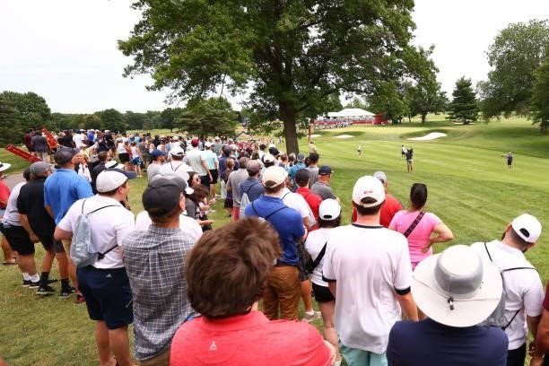 Fans watch Nelly Korda hit her second shot on the 17th hole during the final round of the Meijer LPGA Classic for Simply Give at Blythefield Country...