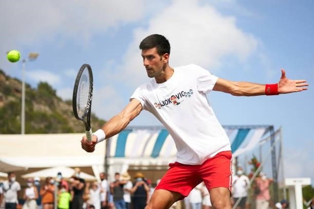 Novak Djokovic of Serbia returns a ball during a training session on day two of the Mallorca Championships 2021 at Country Club de Santa Ponça on...