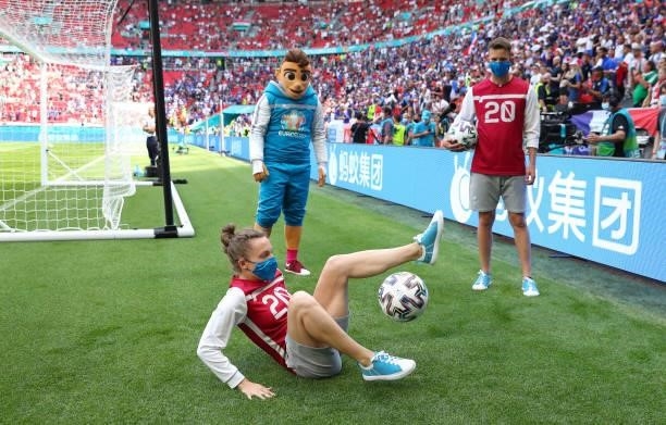 Euro 2020 mascot Skillzy looks on as freestyle footballers perform prior to the UEFA Euro 2020 Championship Group F match between Hungary and France...