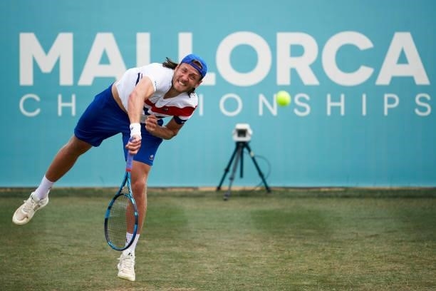 Lucas Pouille of France serves during his Second Round Qualifying match against Pedro Souza of Portugal on day two of the Mallorca Championships 2021...