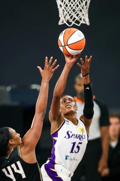 Guard Brittney Sykes of the Los Angeles Sparks shoots defended by guard/forward Betnijah Laney of the New York Liberty in the second half at Los...