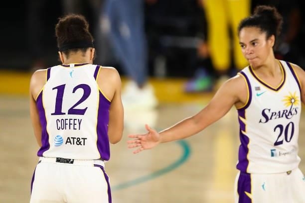 Forward Nia Coffey of the Los Angeles Sparks reacts to her missed shot at the end of the game against the New York Liberty at Los Angeles Convention...