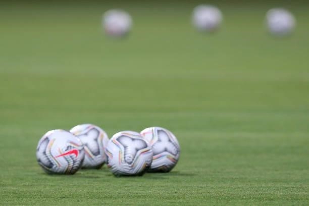 Match balls sit in the pitch before a group b match between Colombia and Peru as part of Copa America Brazil 2021 at Estadio Olimpico on June 20,...