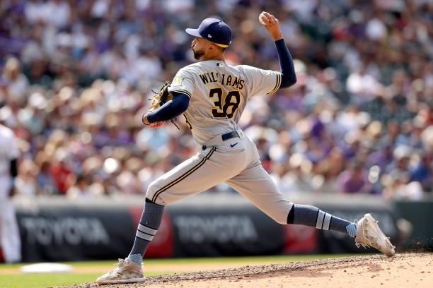 Pitcher Devin Williams of the Milwaukee Brewers throws against the Colorado Rockies in the eighth inning at Coors Field on June 20, 2021 in Denver,...