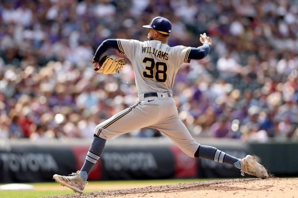 Pitcher Devin Williams of the Milwaukee Brewers throws against the Colorado Rockies in the eighth inning at Coors Field on June 20, 2021 in Denver,...
