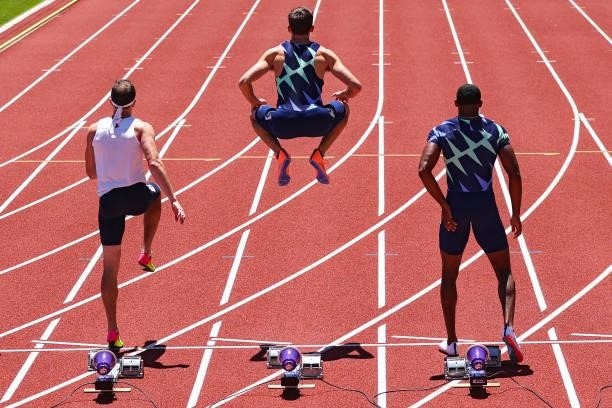 Garrett Scantling, Devon Williams and Samuel Black prepare to compete in the Men's Decathlon 100 Meters on day 2 of the 2020 U.S. Olympic Track &...