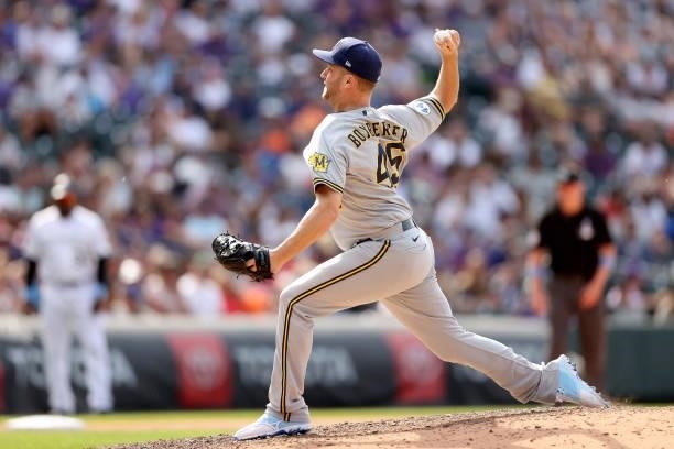Pitcher Brad Boxberger of the Milwaukee Brewers throws against the Colorado Rockies in the ninth inning at Coors Field on June 20, 2021 in Denver,...