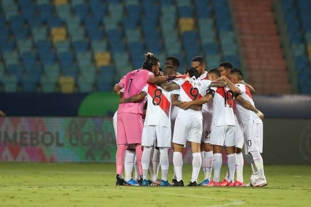 Players of Peru huddle before a group b match between Colombia and Peru as part of Copa America Brazil 2021 at Estadio Olimpico on June 20, 2021 in...