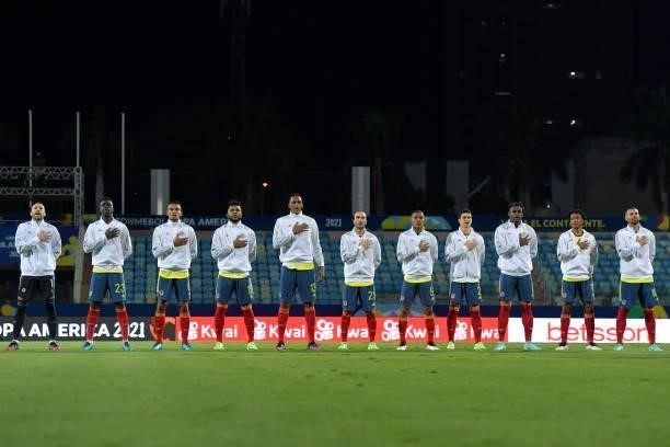 Players of Colombia sing their national anthem before a group b match between Colombia and Peru as part of Copa America Brazil 2021 at Estadio...