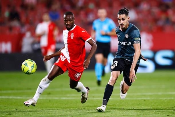 Óscar Valentin Martin of Rayo Vallecano challenges for the ball against Mamadou Sylla of Girona FC during the La Liga Smartbank Playoff Final 2nd Leg...