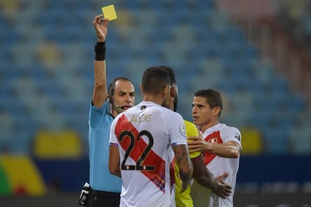 Referee Esteban Ostojich shows a yellow card to Miguel Borja of Colombia during a group b match between Colombia and Peru as part of Copa America...