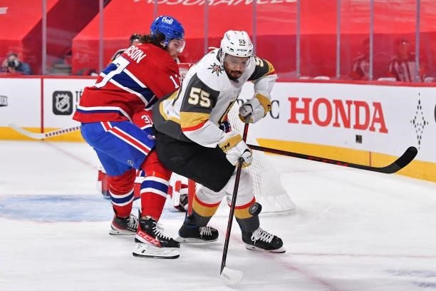 Keegan Kolesar of the Vegas Golden Knights and Josh Anderson of the Montreal Canadiens battle for the puck during the first period in Game Four of...