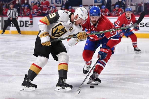 Reilly Smith of the Vegas Golden Knights is defended by Jeff Petry of the Montreal Canadiens during the first period in Game Four of the Stanley Cup...