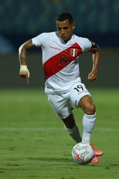 Yoshimar Yotún of Peru controls the ball during a group b match between Colombia and Peru as part of Copa America Brazil 2021 at Estadio Olimpico on...