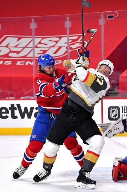 Ben Chiarot of the Montreal Canadiens and Max Pacioretty of the Vegas Golden Knights battle for position during the first period in Game Four of the...