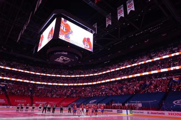The Vegas Golden Knights and Montreal Canadiens stand for the national anthem prior to Game Four of the Stanley Cup Semifinals of the 2021 Stanley...