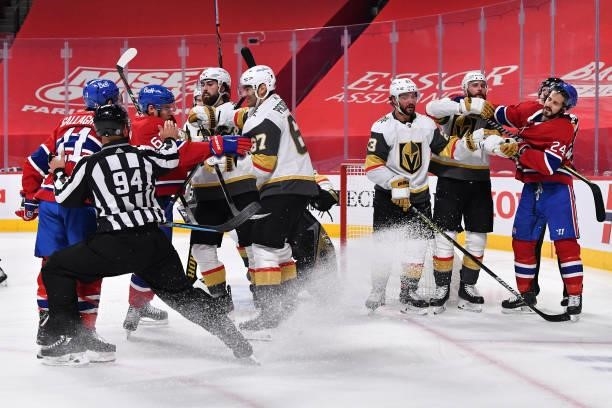 The Vegas Golden Knights and Montreal Canadiens mix it up during the second period in Game Four of the Stanley Cup Semifinals of the 2021 Stanley Cup...