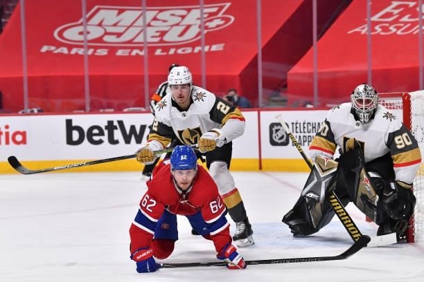Artturi Lehkonen of the Montreal Canadiens is checked by Zach Whitecloud of the Vegas Golden Knights during the second period in Game Four of the...