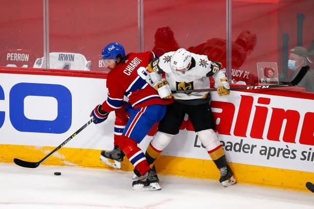 Ben Chiarot of the Montreal Canadiens battles for the puck with Tomas Nosek of the Vegas Golden Knights during the second period in Game Four of the...