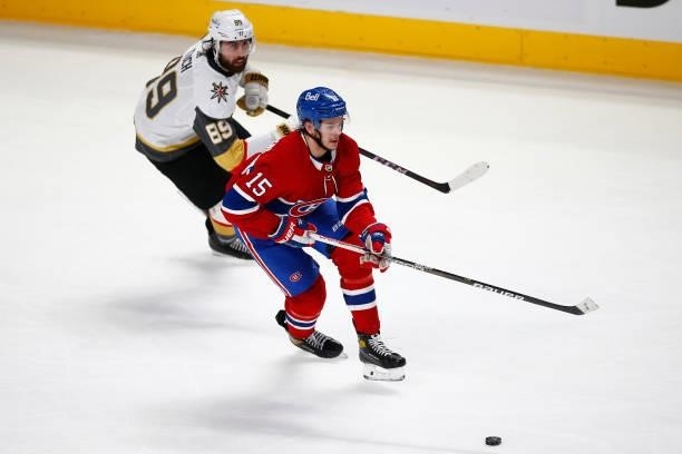 Jesperi Kotkaniemi of the Montreal Canadiens is pursued by Alex Tuch of the Vegas Golden Knights during the second period in Game Four of the Stanley...