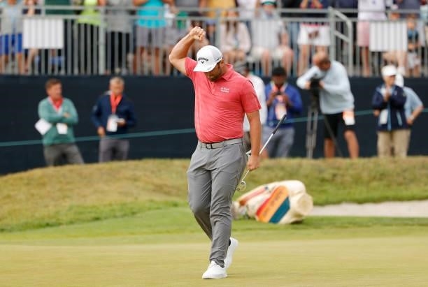 Jon Rahm of Spain celebrates making a putt for birdie on the 18th green during the final round of the 2021 U.S. Open at Torrey Pines Golf Course on...