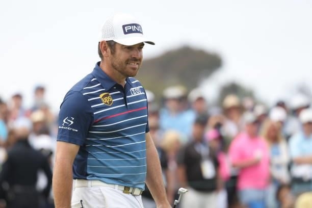 Louis Oosthuizen of South Africa reacts to a missed putt for birdie on the 16th green during the final round of the 2021 U.S. Open at Torrey Pines...