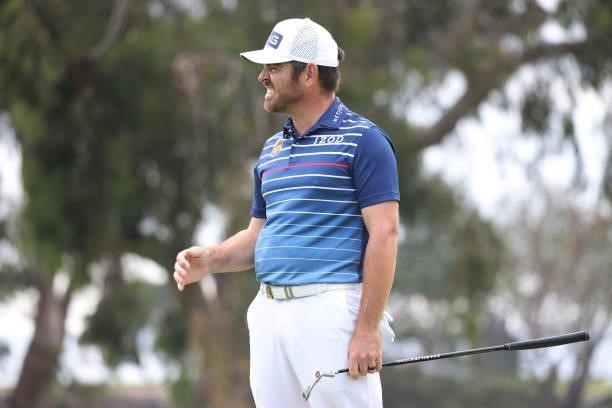 Louis Oosthuizen of South Africa reacts to a missed putt for par on the 17th green during the final round of the 2021 U.S. Open at Torrey Pines Golf...