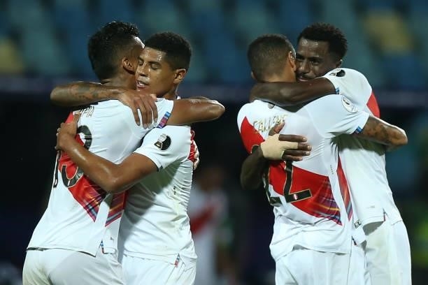Renato Tapia of Peru celebrates with teammates after winning a group B match between Colombia and Peru as part of Copa America Brazil 2021 at Estadio...