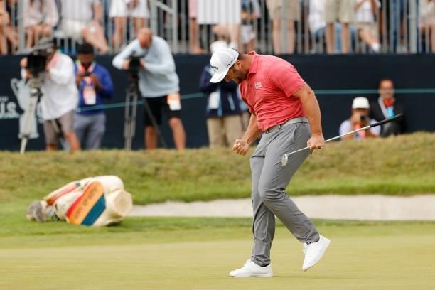 Jon Rahm of Spain celebrates making a putt for birdie on the 18th green during the final round of the 2021 U.S. Open at Torrey Pines Golf Course on...