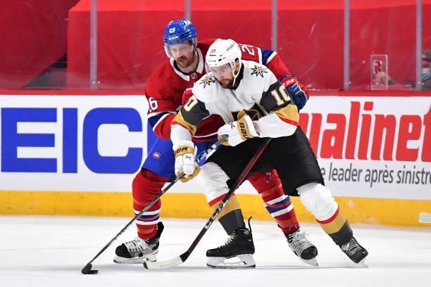 Nicolas Roy of the Vegas Golden Knights is defended by Jeff Petry of the Montreal Canadiens during the second period in Game Four of the Stanley Cup...