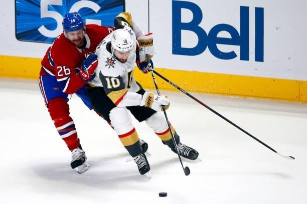 Nicolas Roy of the Vegas Golden Knights is defended by Jeff Petry of the Montreal Canadiens during the second period in Game Four of the Stanley Cup...