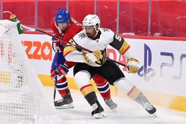 Eric Staal of the Montreal Canadiens and Keegan Kolesar of the Vegas Golden Knights battle behind the net during the third period in Game Four of the...