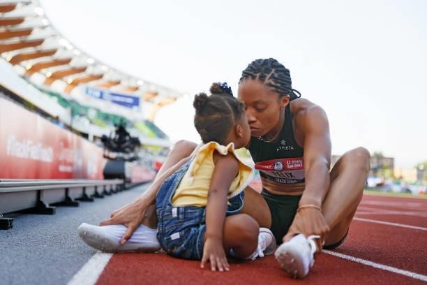 Allyson Felix celebrates with her daughter Camryn after finishing second in the Womne's 400 Meters Final on day three of the 2020 U.S. Olympic Track...