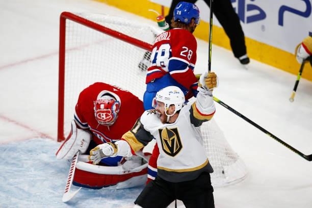 Jonathan Marchessault of the Vegas Golden Knights celebrates a goal by teammate Brayden McNabb past Carey Price of the Montreal Canadiens during the...