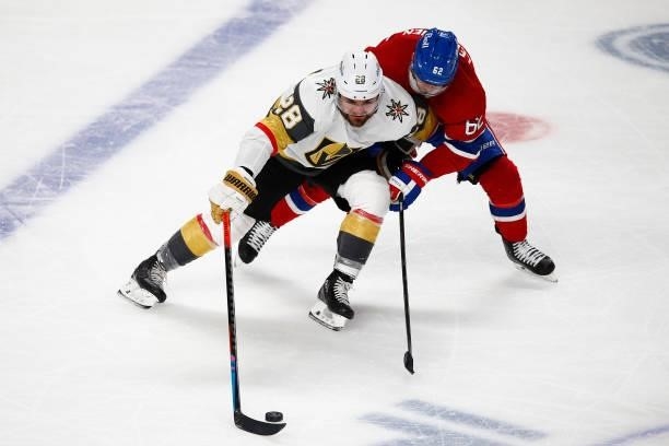 William Carrier of the Vegas Golden Knights is defended by Artturi Lehkonen of the Montreal Canadiens during the third period in Game Four of the...