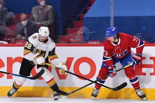 Nick Holden of the Vegas Golden Knights and Tyler Toffoli of the Montreal Canadiens battle for the puck during the third period in Game Four of the...