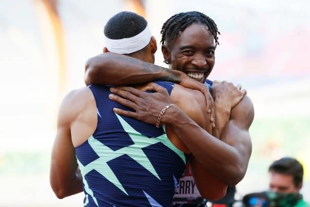 Michael Norman and Michael Cherry celebrate after finishing first and second in the Men's 400 Meters Final on day three of the 2020 U.S. Olympic...