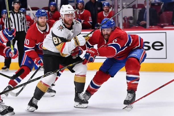 Jonathan Marchessault of the Vegas Golden Knights is defended by Shea Weber of the Montreal Canadiens during the third period in Game Four of the...