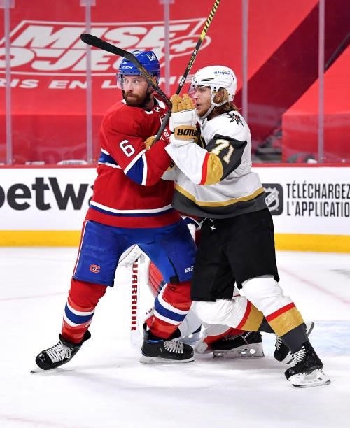 Shea Weber of the Montreal Canadiens and William Karlsson of the Vegas Golden Knights battle in front of goal during the third period in Game Four of...