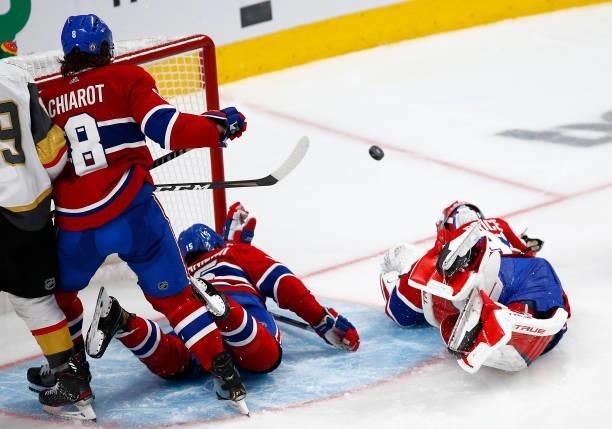 Carey Price of the Montreal Canadiens allows the game-winning goal to Nicolas Roy of the Vegas Golden Knights during the first overtime period in...