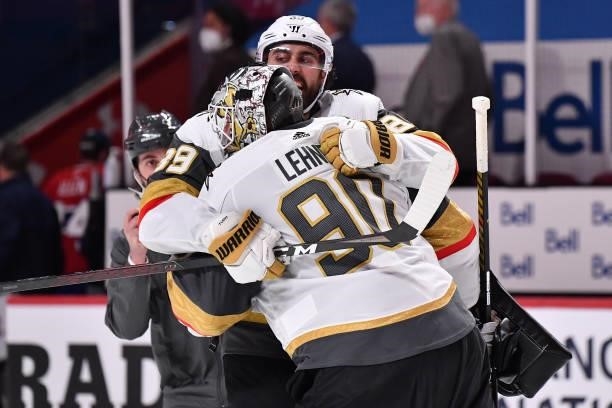 Alex Tuch and Robin Lehner of the Vegas Golden Knights celebrate their team's 2-1 overtime victory against the Montreal Canadiens in Game Four of the...