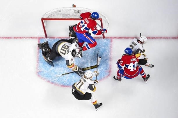Eric Staal of the Montreal Canadiens collides with Robin Lehner of the Vegas Golden Knights during the first period in Game Four of the Stanley Cup...