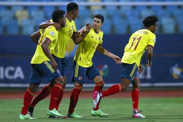 Miguel Borja of Colombia celebrates with teammates Yerry Mina, Juan Cuadrado and Stefan Medina after scoring the first goal of his team during a...