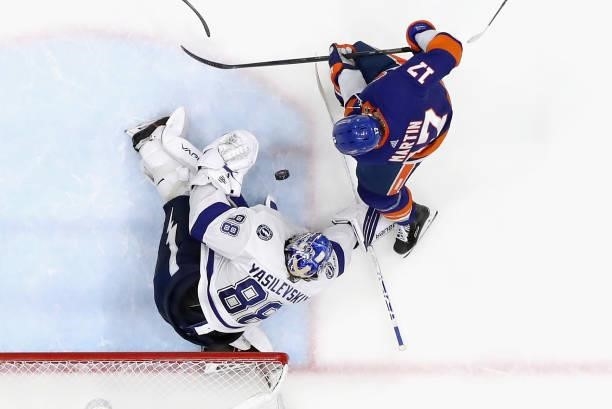 Andrei Vasilevskiy of the Tampa Bay Lightning defends against Matt Martin of the New York Islanders in Game Four of the Stanley Cup Semifinals during...