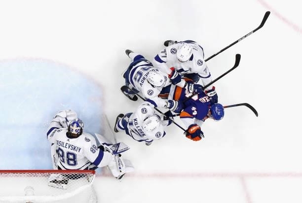 Andrei Vasilevskiy and the Tampa Bay Lightning defends against Jean-Gabriel Pageau of the New York Islanders in Game Four of the Stanley Cup...
