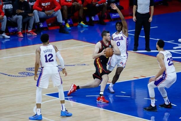 Danilo Gallinari of the Atlanta Hawks drives past Tyrese Maxey of the Philadelphia 76ers during the first quarter during Game Seven of the Eastern...